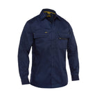 Navy blue men's workwear shirt with chest pockets and yellow accents