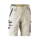 Beige workwear cargo shorts with multiple pockets