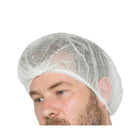 White disposable hairnet cap