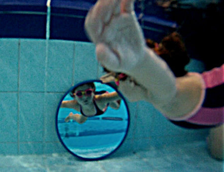 Learn to swim pool mirror mounted poolside